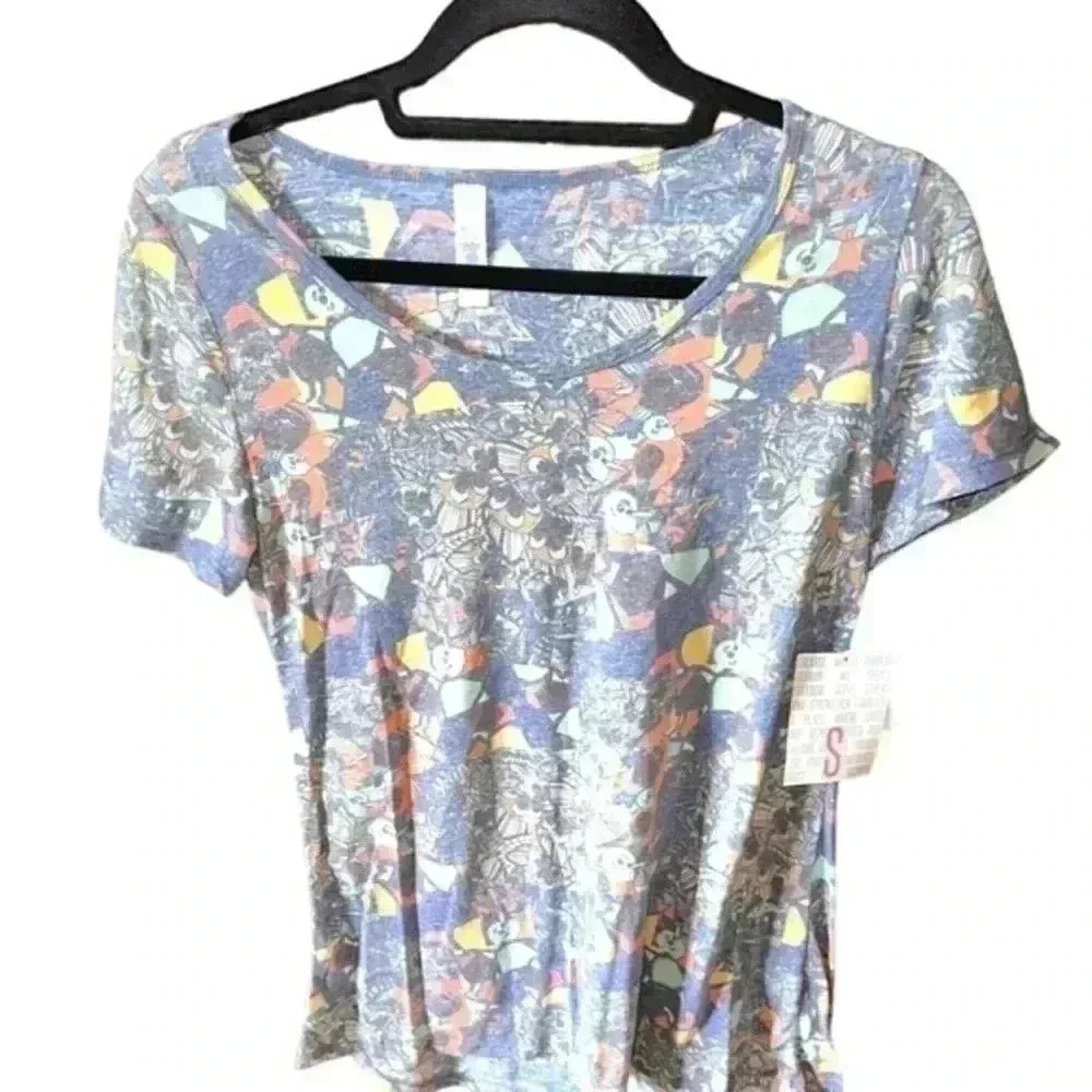 Lularoe Small blue abstract print Classic T . Faded, washed look. NWT. Soft feel